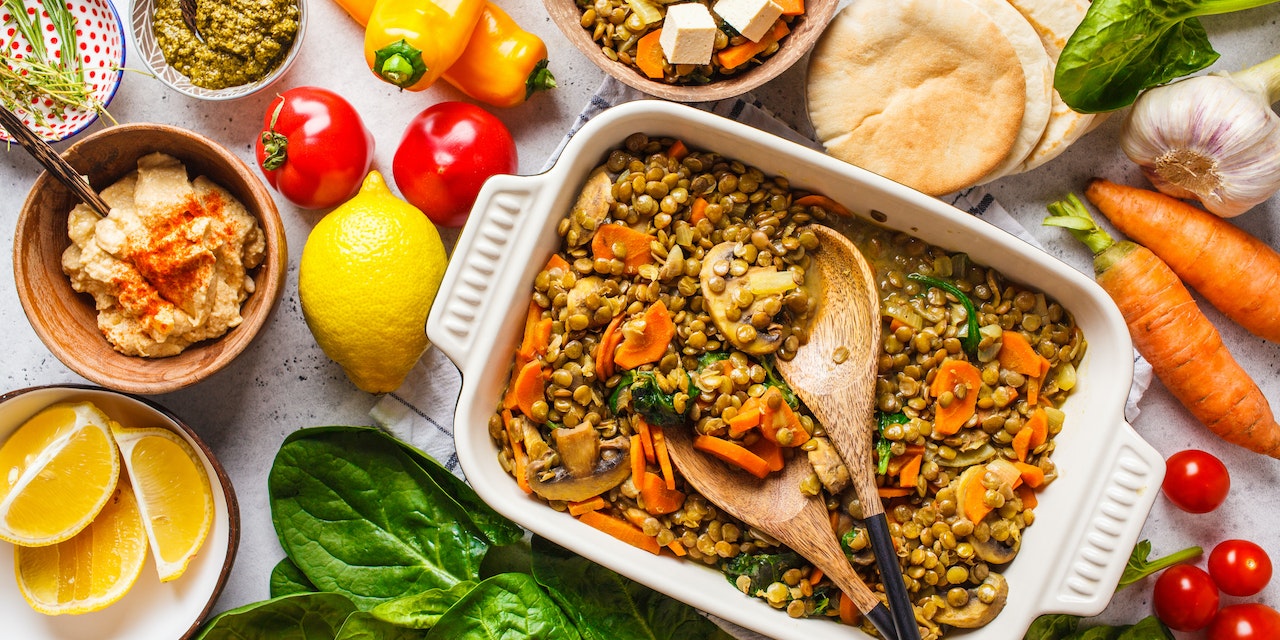 Healthy vegan meal with lentil curry on a table