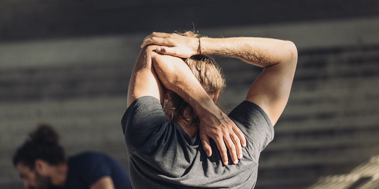 Man stretching his arms 